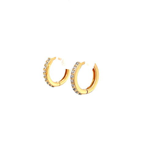 The Rose gold Zirconia stones Huggies earrings are exquisite hoop earrings adorned with small white gemstones on the outer edge, set against a pristine white background.